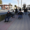 ФОТО+ВИДЕО - Түркестанда аткаминерлер майып коляскасы менен шаар ичин аралашты