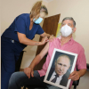 Аргентинадагы шаардын мэри вируска каршы эмдөөгө Путиндин сүрөтү менен келди