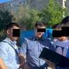 Милициянын тергөөчүсү пара менен кармалды