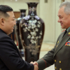 ВИДЕО - Ким Чен Ын показал Шойгу новейшие беспилотники и МБР на выставке вооружений