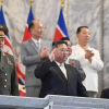 Шойгу и Ким Чен Ын посетили военный парад в КНДР