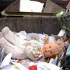 Найденного малыша в мусорном баке назвали в честь президента