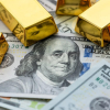 Доллар арзандап, алтын кымбаттоодо