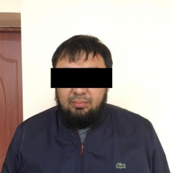 ИИМдин КМКнын УККБнын ыкчам кызматкерлери ири суммадагы акча каражатын опуза талап кылууга шектелген жаранды кармашты