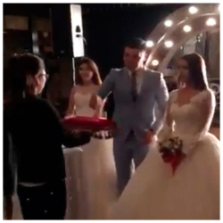 ВИДЕО - Кытайлык жаран эки кыргыз кызына бир убакта үйлөнүп жаткан видео тарады