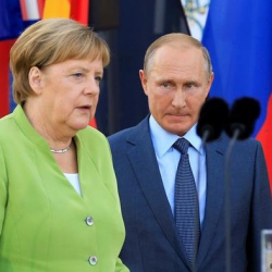 Меркель Орусияга эскертүү берди
