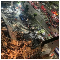 ВИДЕО+СҮРӨТ- Кытайлар коронавирус менен жабыркагандар жаткан имаратты атайын кулатканбы?