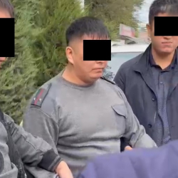 ФОТО - Оборотень в погонах. ГКНБ задержал сотрудника УВД