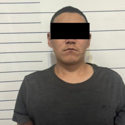 На улице в Бишкеке ограбили иностранца, применив удушающий прием