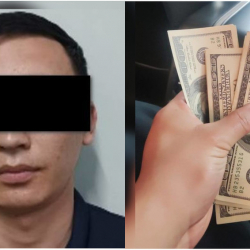 Жасалма 50 000 долларды сатууга аракет кылган шектүү кармалды