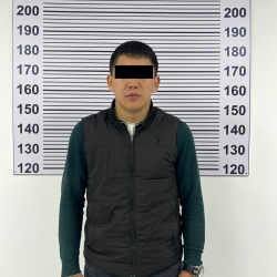 УКМК: Таласта милиция кызматкери пара менен кармалды